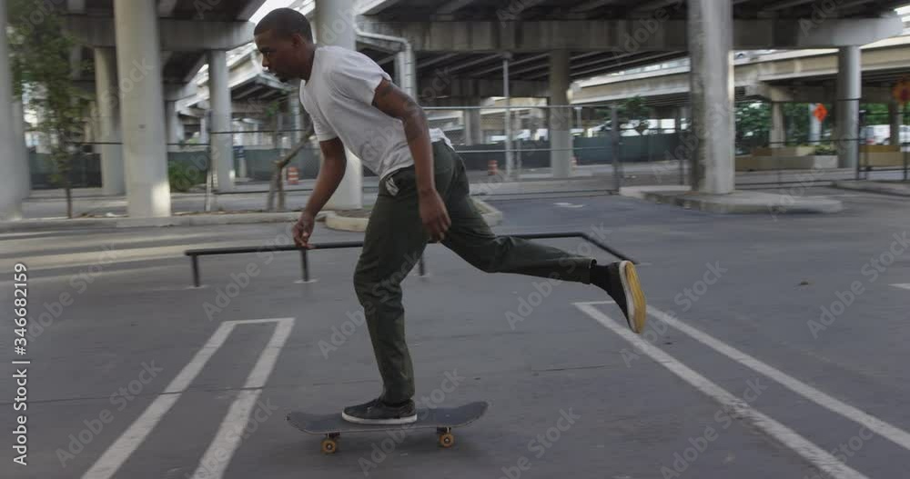 African American skateboarder at skate park