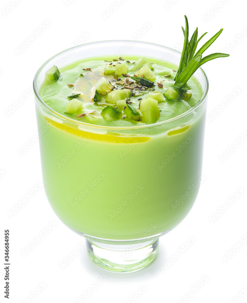 Glass with cold cucumber soup on white background Glass with cold cucumber soup on white background