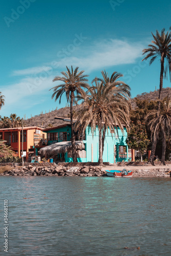 Colorful buildings in the Mulege. Baja California Sur. Mexico. Old lamp. © Dary Maltseva