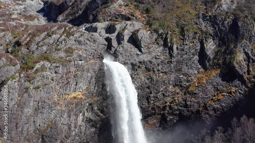 Majestic Manafossen Waterfall, Norway. Drone Aerial View of Fresh Glacial Snow Melted Water in Pristine Landscape of Rogaland photo