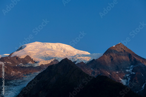 the part of Mont-Blanc massif in the evening sunset light, Chamonix-Mont-Blanc, France © almostfuture
