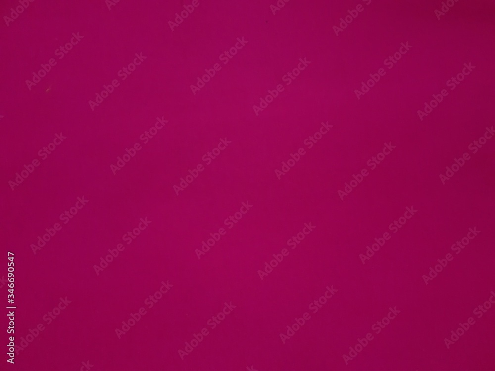 pink background with a paper