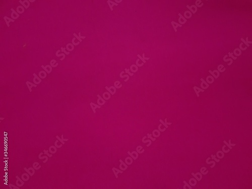 pink background with a paper