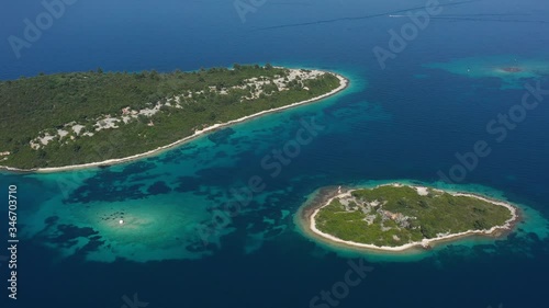 Beautiful mediterranean Islands Kamenjak, Planjak, Vrnik near Island of Korcula, surrounded with blue turquoise Sea - Aerial Panoramic View photo