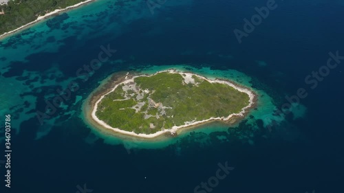 Beautiful mediterranean Island Kamenjak near Island of Korcula, surrounded with blue turquoise Sea - Aerial Panoramic View photo