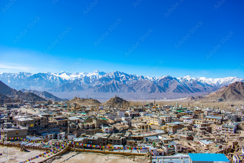 View of Leh City from Mountain top with The Himalayan Mountain at Back