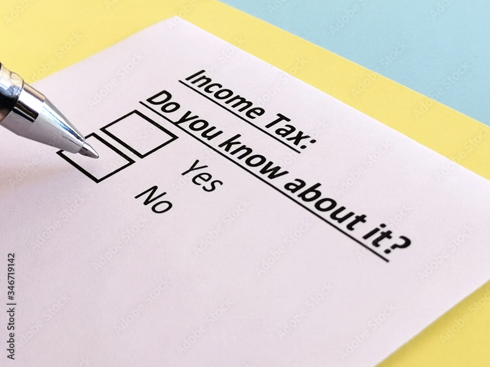 One person is answering question about income tax. One person is answering question about income tax.