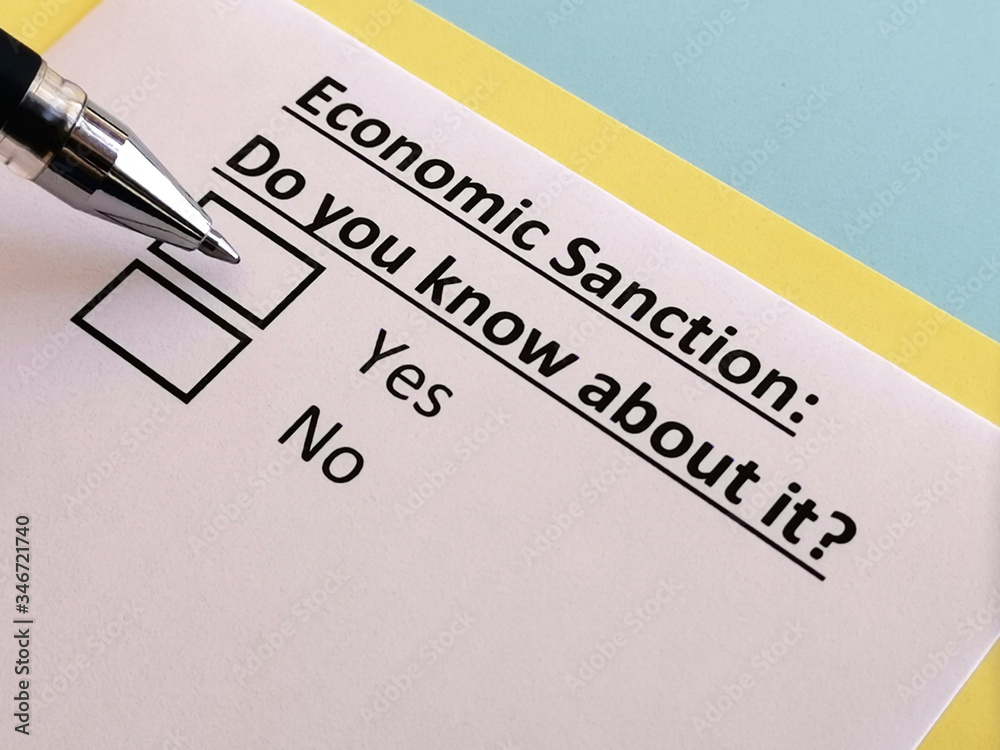 One person is answering quetion about economic sanction. One person is answering quetion about economic sanction.