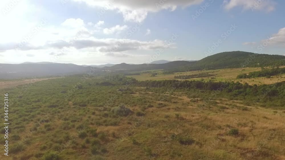 Aerial drone flight over green hill, opening beautiful panorama view at green valley with hills, mountains. Hungary, Europe 4K Aerial drone flight over green hill, opening beautiful panorama view at green valley with hills, mountains. Hungary, Europe 4K