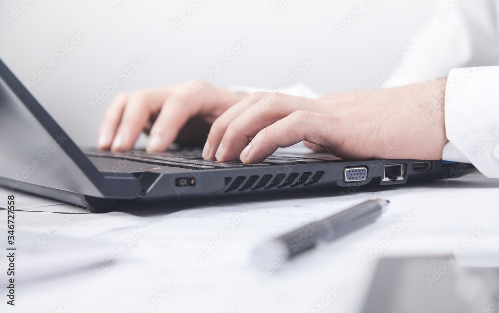 Businessman typing on computer keyboard. Businessman typing on computer keyboard.
