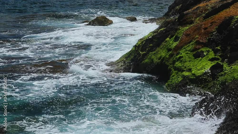 Waves break about the rocky coast of the azure coast, splashes, clear water, azure water, famous place Waves break about the rocky coast of the azure coast, splashes, clear water, azure water, famous place
