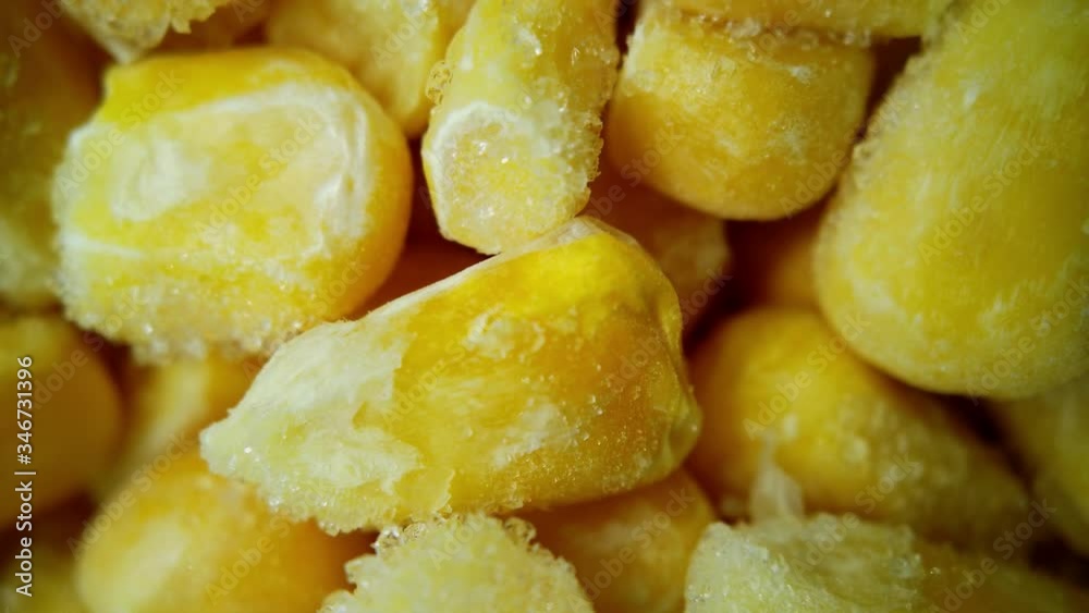 Sweet and juicy frozen corn kernels macro close up Sweet and juicy frozen corn kernels macro close up