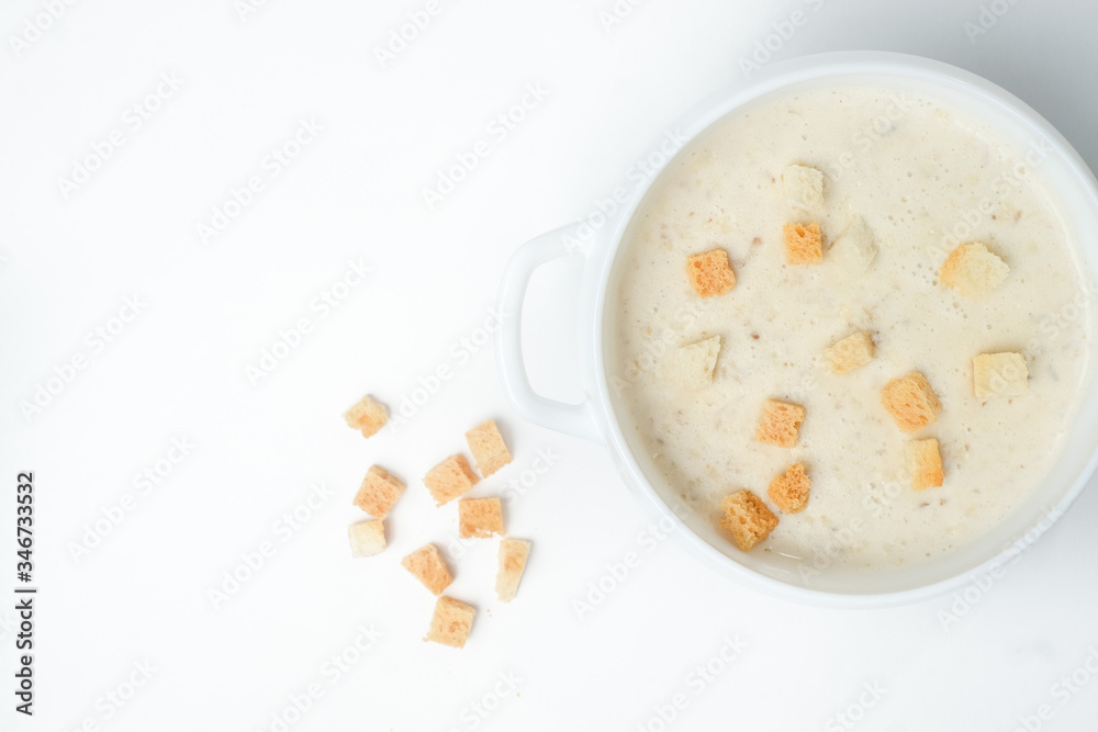 food soup in a white plate on a white background food soup in a white plate on a white background