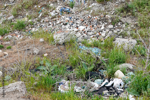 Big rubbish dump neare the road photo