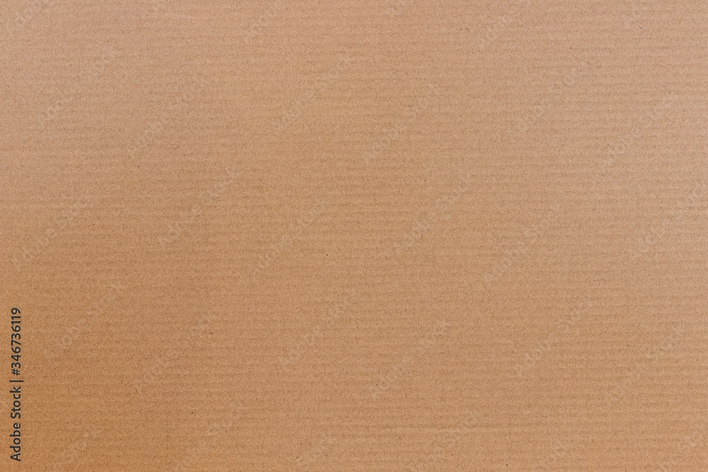 Brown cardboard background with horizontal strips, paper texture for design. Brown cardboard background with horizontal strips, paper texture for design.