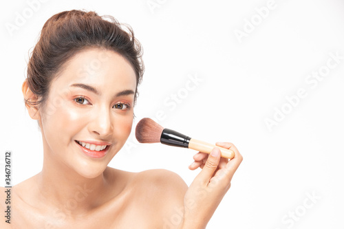 Beauty asian woman brown hair looking smile in camera happiness and hold make up brush and cheerful with make up brush,Beauty Concept on white background.