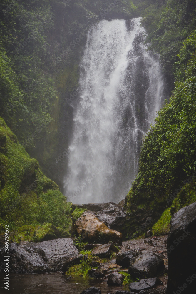 Cascadas de peguche,.A small beautiful waterfall in a lush green environmnent in Ecuador, close to Otavalo.