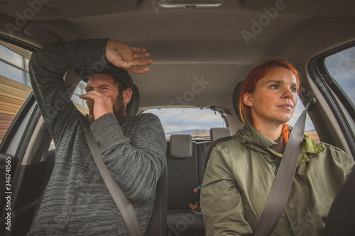 Photos A woman is calmly driving a car and a man in the next seat is scared as hell