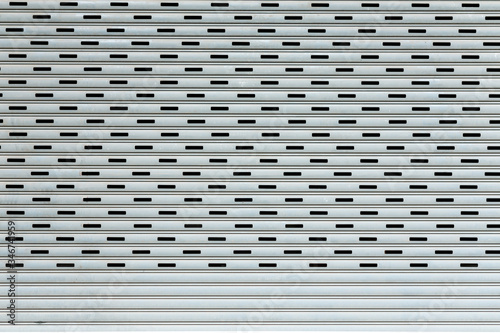 Metal roller shutter door closed.