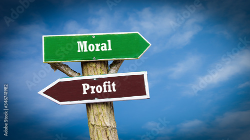 Street Sign to Moral versus Profit © Thomas Reimer