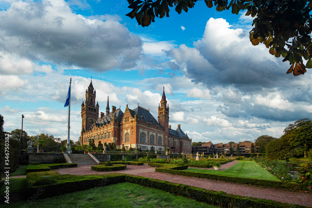 Fototapeta premium THE HAGUE, 26 September 2018 - Sunny early morning on the Peace Palace garden, seat of the International Court of Justice, principal judicial organ of the United Nations, Netherlands