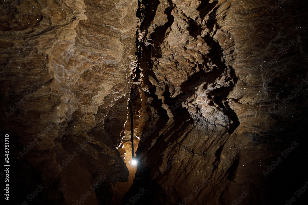 Dark Tunnel Cave has nobody. Tourist route, tours, adventures and interesting places. inside ancient crystal formations, stones, geology, explore of rocks of the soil. village Mlynky . Ukraine Dark Tunnel Cave has nobody. Tourist route, tours, adventures and interesting places. inside ancient crystal formations, stones, geology, explore of rocks of the soil. village Mlynky . Ukraine