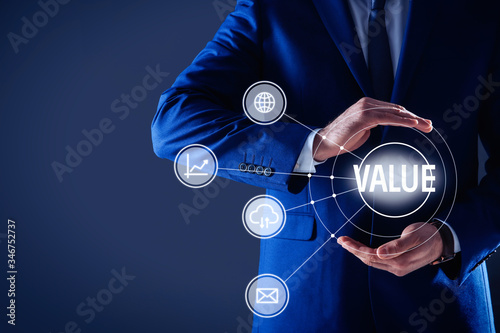 Businessman demonstrating directions of added values on blue background, closeup