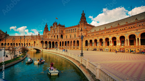 Seville, Spain - 10 February 2020 : Plaza de Espana Spain Square with Boats on the Canal in Seville Spain City Center