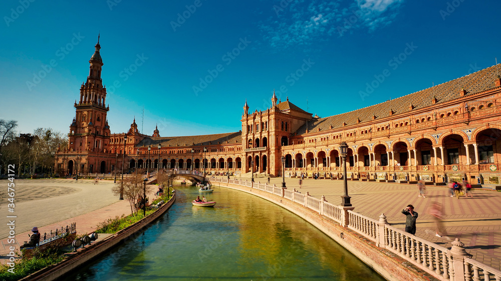 Seville, Spain - 10 February 2020 : Plaza de Espana Spain Square with Boats on the Canal in Seville Spain City Center