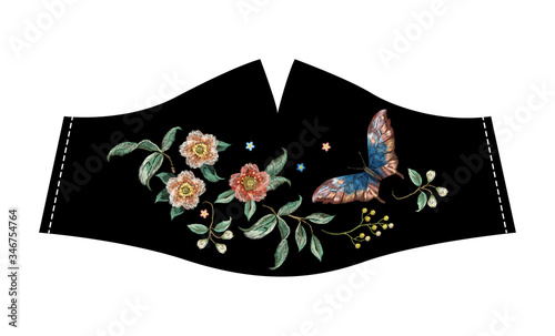    Embroidery trend floral pattern with flowers and butterfly. Vector traditional folk floral on black background for design Face Masks. © natagalitskaia