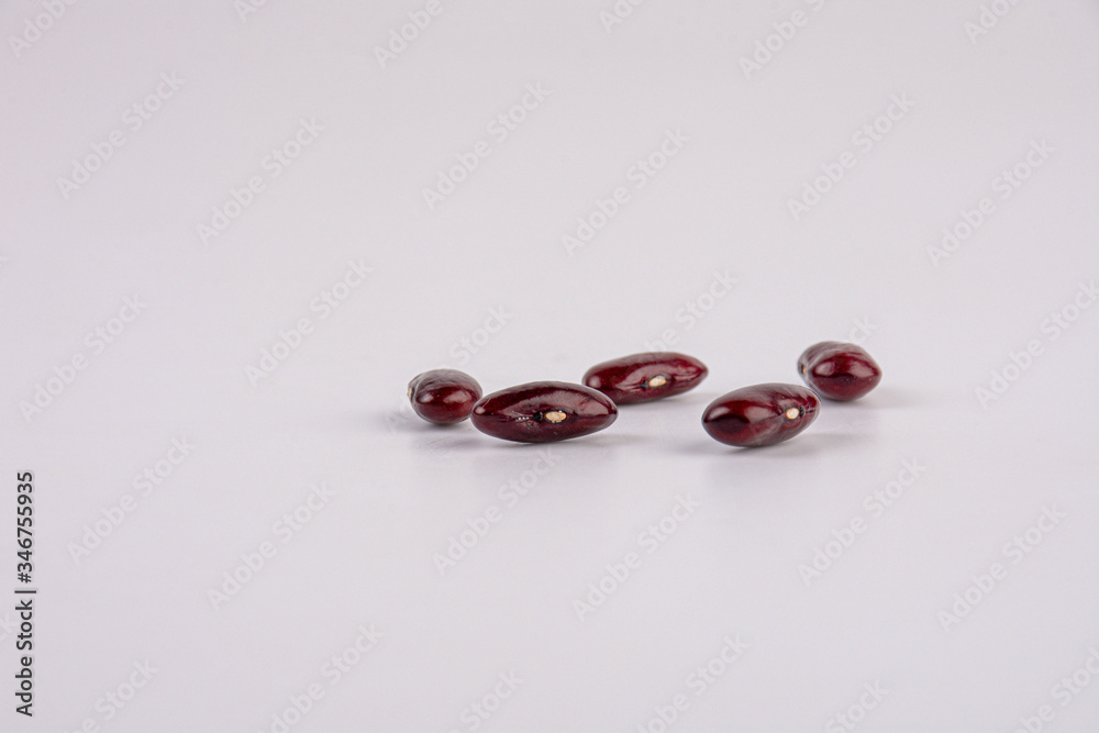 Five Red bean isolated on white background. Close up. Five Red bean isolated on white background. Close up.