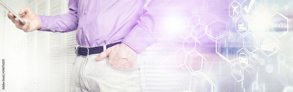 A disposable medical mask sticks out of a pocket instead of a napkin. A man with a disposable mask in a suit and jeans. Individual respiratory protection.