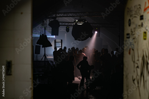 Behind the scenes of video shooting team and equipment silhouette