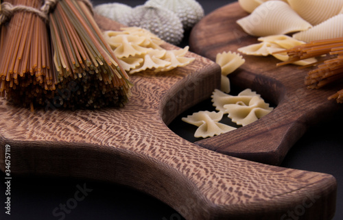 Some sea urchin shells and various types of pasta.