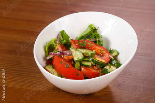 Vegetable salad with tomato, cucumbers