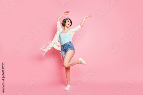Full length body size view of her she nice attractive lovely pretty cheerful cheery positive girl dancing having fun chill out bachelorette air wind blowing isolated over pink pastel color background