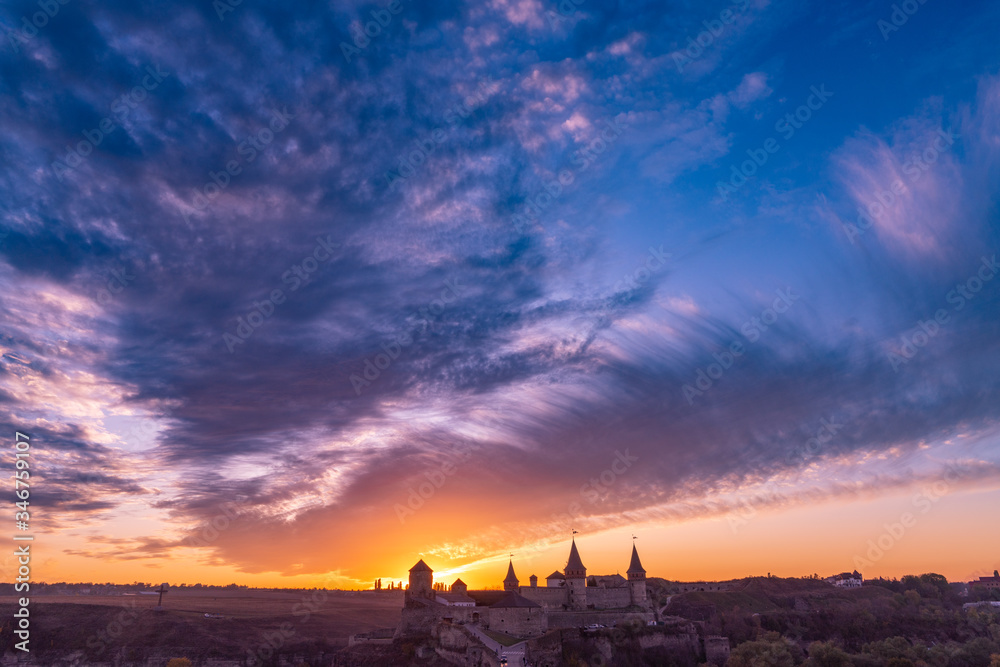 medieval castle or stronghold silhouette and beautiful sunset