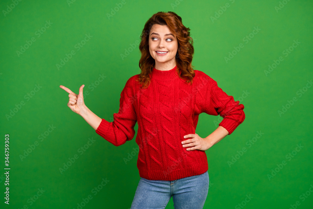 Portrait of positive cheerful girl point index finger copy space recommend suggest select ads promo wear trendy sweater jeans isolated over shine color background Portrait of positive cheerful girl point index finger copy space recommend suggest select ads promo wear trendy sweater jeans isolated over shine color background
