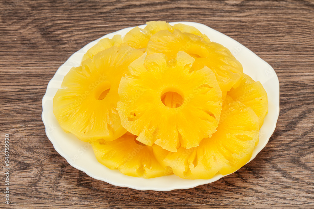 Marinated pineapple rings in the bowl Marinated pineapple rings in the bowl