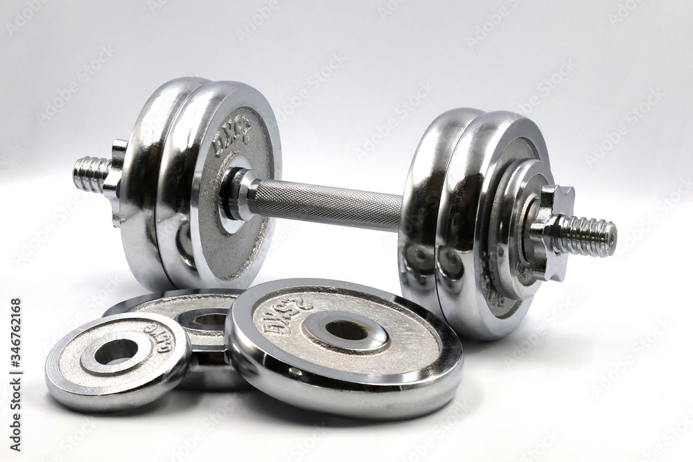 Fototapeta premium dumbbell weights on white background