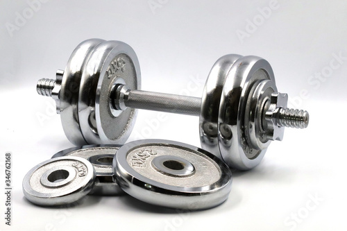 dumbbell weights on white background