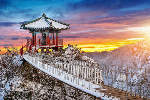 YakSaam Temple at sunset, Geumosan Mountains in winter, Famous mountains in South Korea. photo