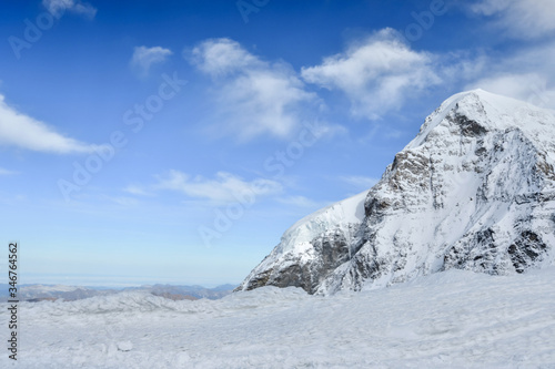 The Top Of Jungfraujoch Mountain In Switzerland. Jungfraujoch Is A Saddle In The Bernese Alps That Connecting The Two Four Thousander Peaks Jungfrau And Mönch photo