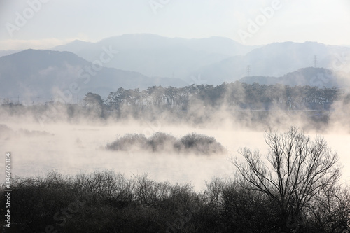 Winter morning landscape of water misty river. Soyang River, Chuncheon City, Korea