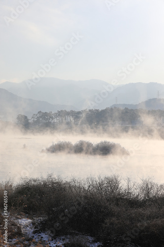 Winter morning landscape of water misty river. Soyang River, Chuncheon City, Korea