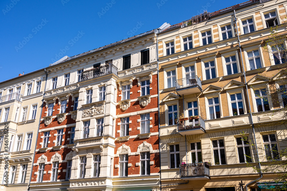 The facades of some renovated old apartment buildings seen in Berlin, Germany