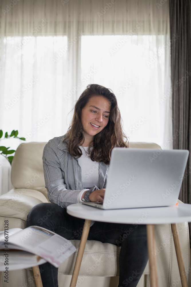 Girl studying and working at home Girl studying and working at home