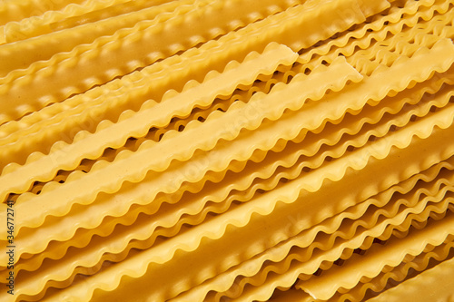 background of dry mafaldine pasta photo