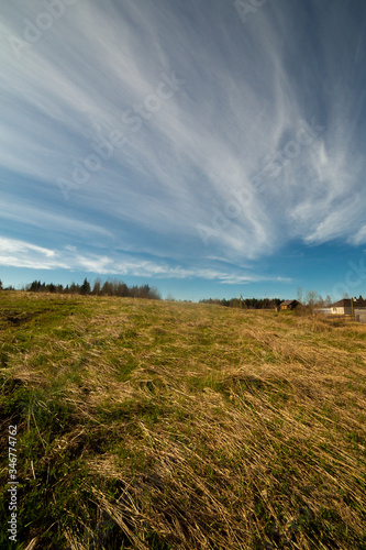 Obraz na płótnie clouds landscape at summer day w salonie