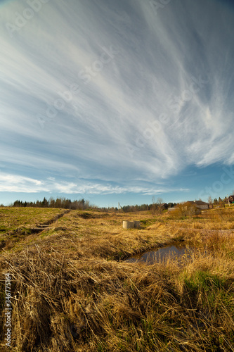 Obraz na płótnie clouds landscape at summer day w salonie